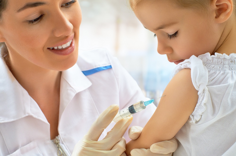 Pediatrician Vaccinating Child Against Chicken Pox